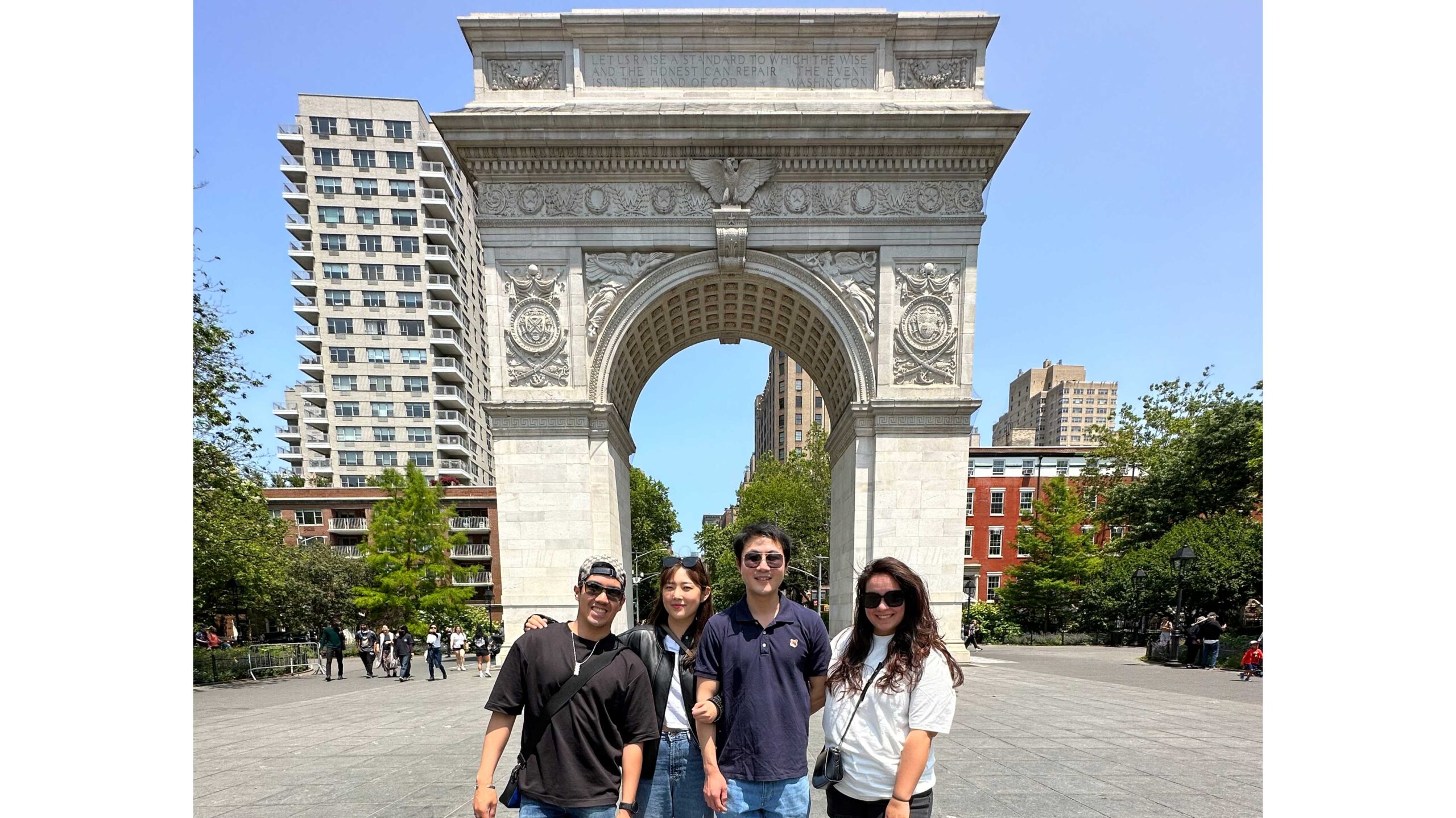 4 friends in front of washington square